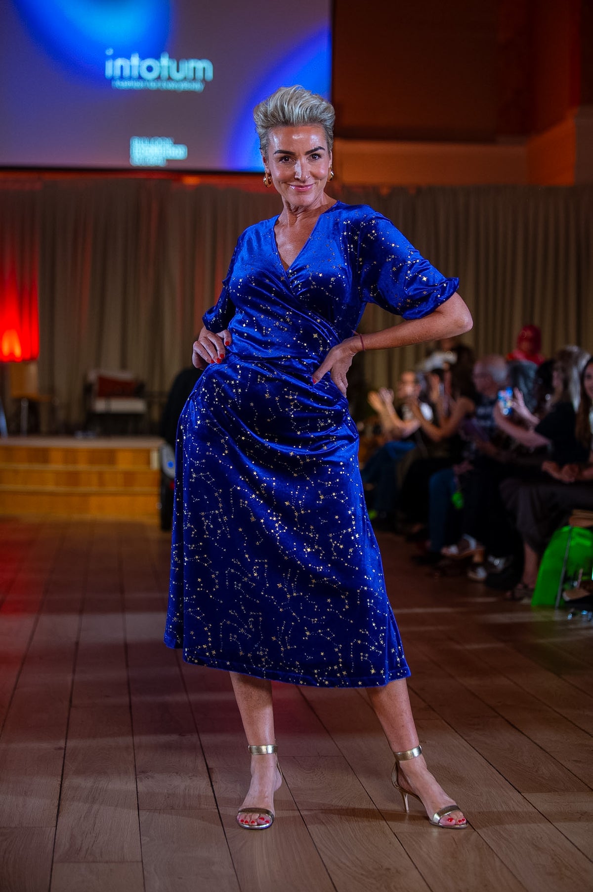 a woman in a blue dress