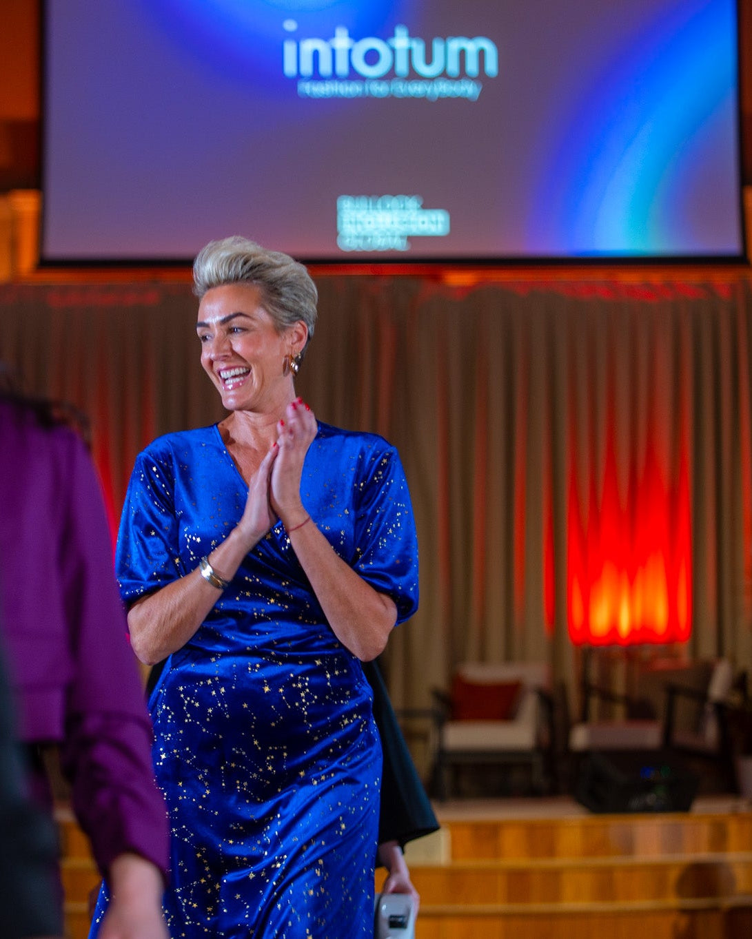 a woman in a blue dress